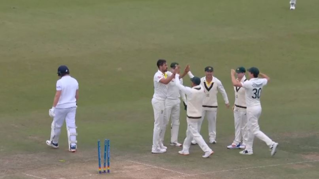 Australia celebrates Jonny Bairstow's wicket.