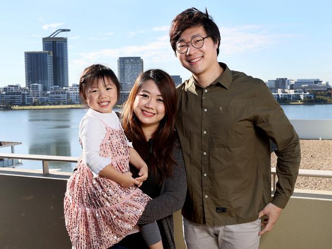 Ruth Leong and Derek Chan are selling their Wentworth Point apartment. Picture: Toby Zerna