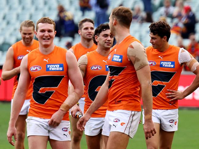 ADELAIDE, AUSTRALIA - APRIL 30: The Giants celebrate their win during the 2022 AFL Round 07 match between the Adelaide Crows and the GWS Giants at Adelaide Oval on April 30, 2022 in Adelaide, Australia. (Photo by James Elsby/AFL Photos via Getty Images)