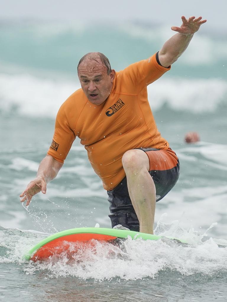 Liberal Democrat leader Sir Ed Davey might not be great at surfing, but his party is predicted to get a lot more seats. Picture: Hugh Hastings/Getty Images