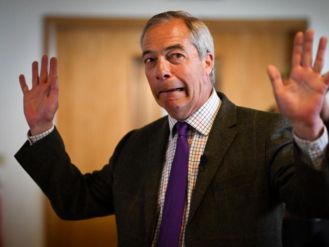 EXETER, ENGLAND - APRIL 14: Reform UK leader Nigel Farage meets with candidates at Sandy Park stadium, on April 14, 2025 in Exeter, England. Political parties are campaigning across England ahead of the selected council and mayoral elections, which are due to take place on May 1st. (Photo by Finnbarr Webster/Getty Images)