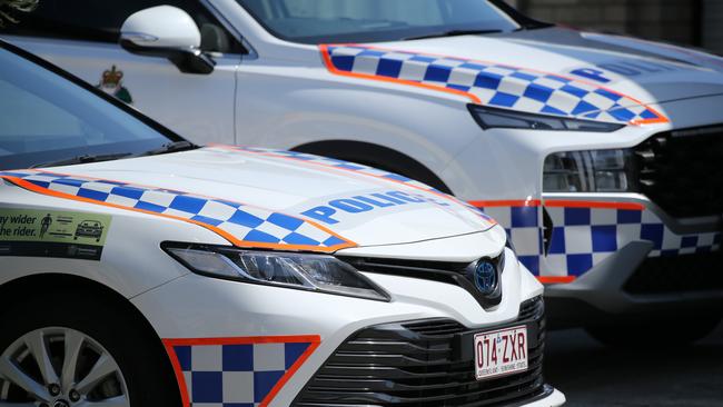 An Ipswich man accused of setting a cop car on fire in broad daylight had marched himself inside the nearby station afterwards and turned himself in “just for a place to sleep,” a court has heard. Picture: Glenn Campbell