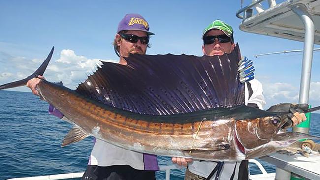 Doug Saunders (left) and Ken Roderick with a ripper Dundee sailfish.