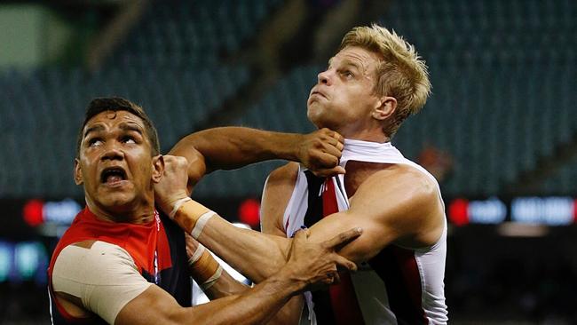 AFL: Round 6 Melbourne v St Kilda at Etihad Stadium, 30th April Melbourne Australia. Melbourne's Neville Jetta battles with St Kilda's Nick Riewoldt Picture: George Salpigtidis