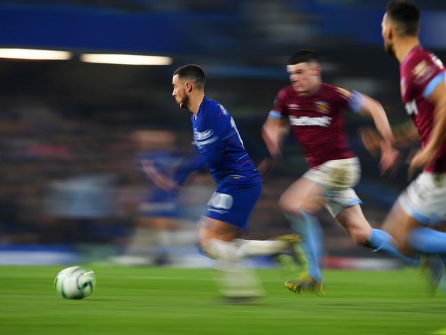 LONDON, ENGLAND - APRIL 08:  Eden Hazard of Chelsea evades Declan Rice of West Ham United during the Premier League match between Chelsea FC and West Ham United at Stamford Bridge on April 08, 2019 in London, United Kingdom. (Photo by Mike Hewitt/Getty Images)