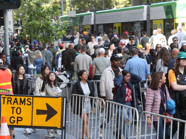 Tram queues to Grand Prix on Spencer St. Picture: David Crosling