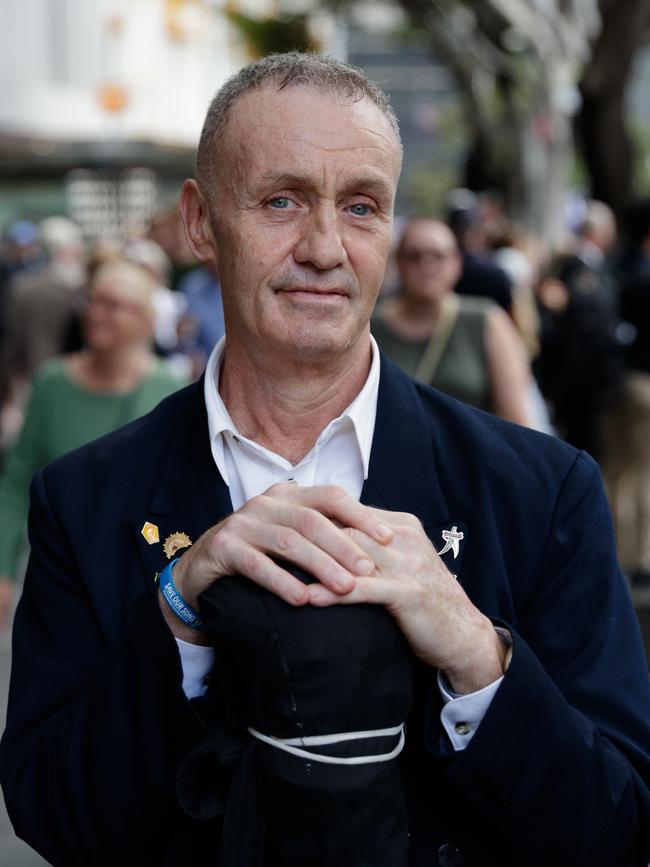 Ralph Greco marched on behalf of his father Vince Greco. Picture: Max Mason-Hubers
