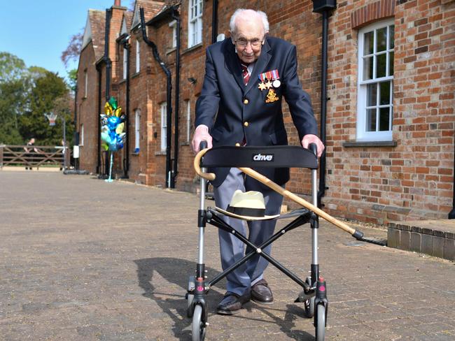 Captain Tom Moore doing a lap of his garden. Picture: AFP