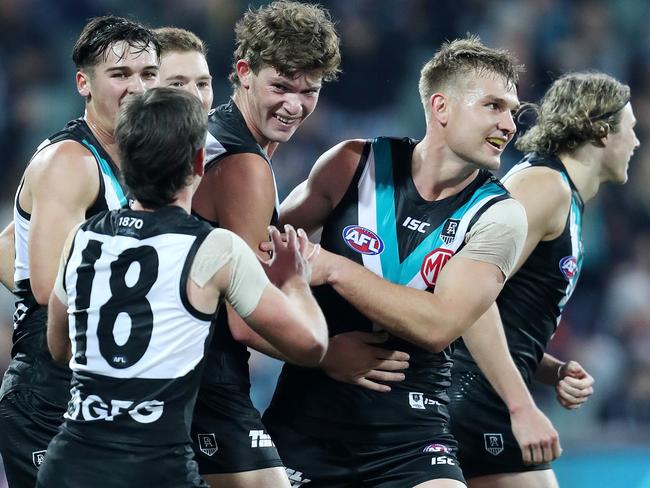 AFL - Saturday, 25th July, 2020 - Port Adelaide v St Kilda at Adelaide Oval. Port Adelaide's Mitch Georgiades celebrates his goal with team mates including Zak Butters and Ollie Wines Picture: Sarah Reed