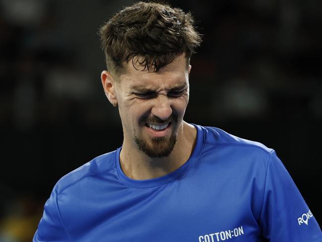 MELBOURNE, AUSTRALIA - JANUARY 15: Thanasi Kokkinakis of Australia reacts in the Men's Singles Second Round match against Jack Draper of Great Britain during day four of the 2025 Australian Open at Melbourne Park on January 15, 2025 in Melbourne, Australia. (Photo by Daniel Pockett/Getty Images)