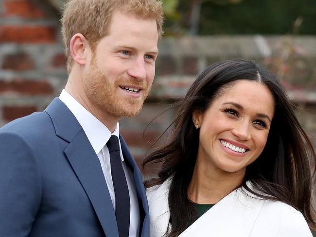 LONDON, ENGLAND - NOVEMBER 27:  Prince Harry and actress Meghan Markle during an official photocall to announce their engagement at The Sunken Gardens at Kensington Palace on November 27, 2017 in London, England.  Prince Harry and Meghan Markle have been a couple officially since November 2016 and are due to marry in Spring 2018.  (Photo by Chris Jackson/Chris Jackson/Getty Images)