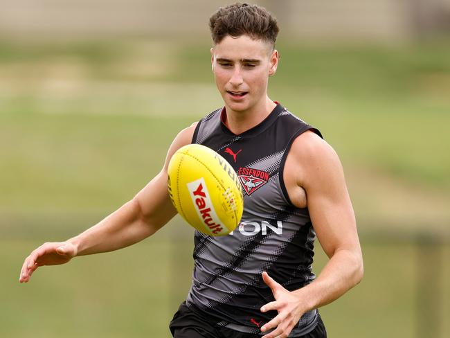 MELBOURNE, AUSTRALIA - JANUARY 16: Elijah Tsatas of the Bombers in action during the Essendon Bombers AFL training session at The Hangar on January 16, 2025 in Melbourne, Australia. (Photo by Michael Willson/AFL Photos via Getty Images)