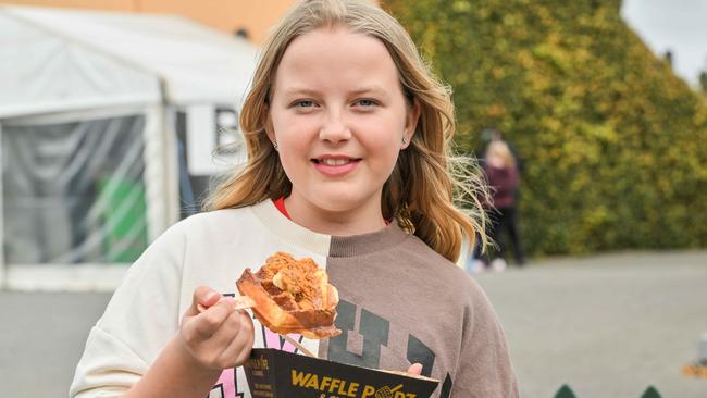 Olivia Joyce, 11, enjoying waffles. Picture: Brenton Edwards