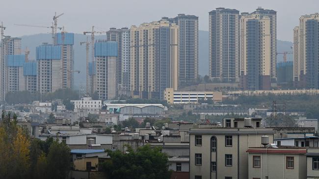 Residential buildings under construction are seen in Kunming, in southwestern Yunnan province on October 23, 2021. Picture: Jade Gao / AFP