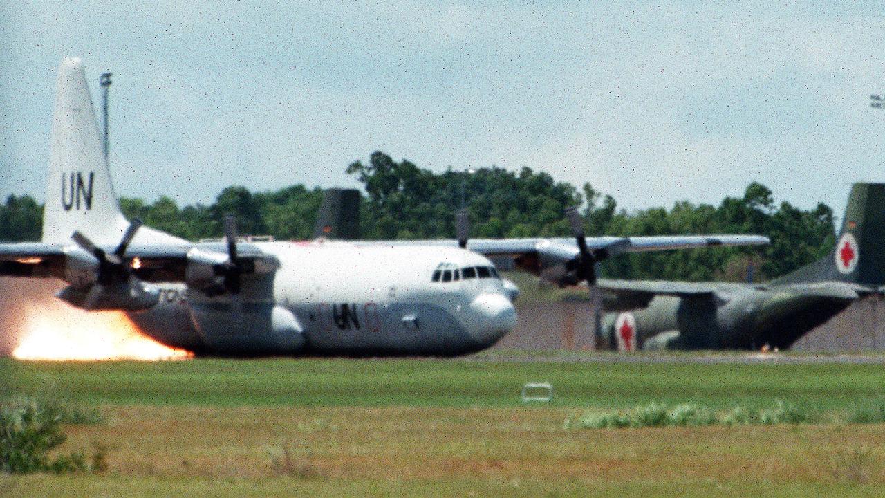 2000: A United Nations aeroplane plane makes an emergency landing on its belly undercarriage using no wheels at Darwin Airport