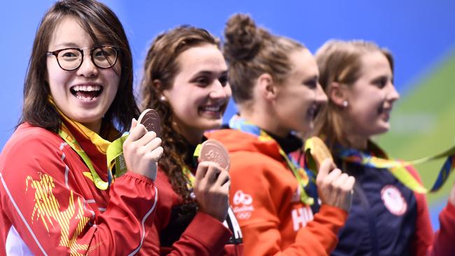 Fu on the podium with her bronze medal.