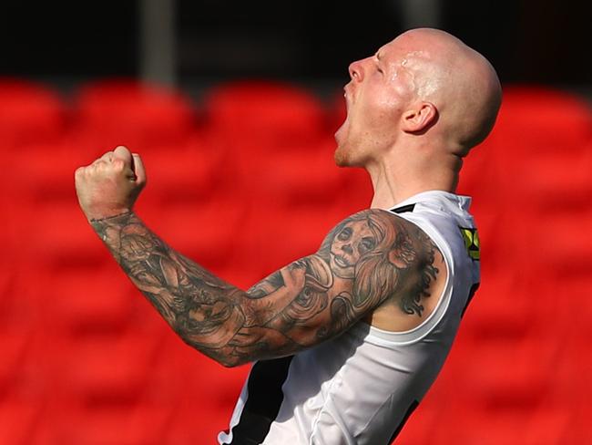 GOLD COAST, AUSTRALIA - JULY 11: Zak Jones of the Saints celebrates a goal during the round 6 AFL match between the Fremantle Dockers and the St Kilda Saints at Metricon Stadium on July 11, 2020 in Gold Coast, Australia. (Photo by Chris Hyde/Getty Images)