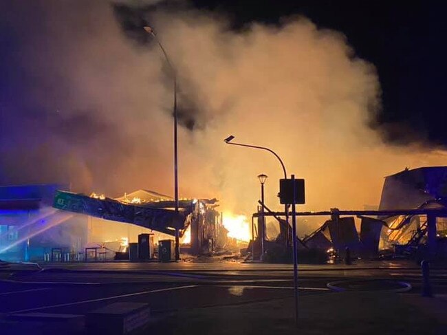 Motel evacuated as fire razes restaurants