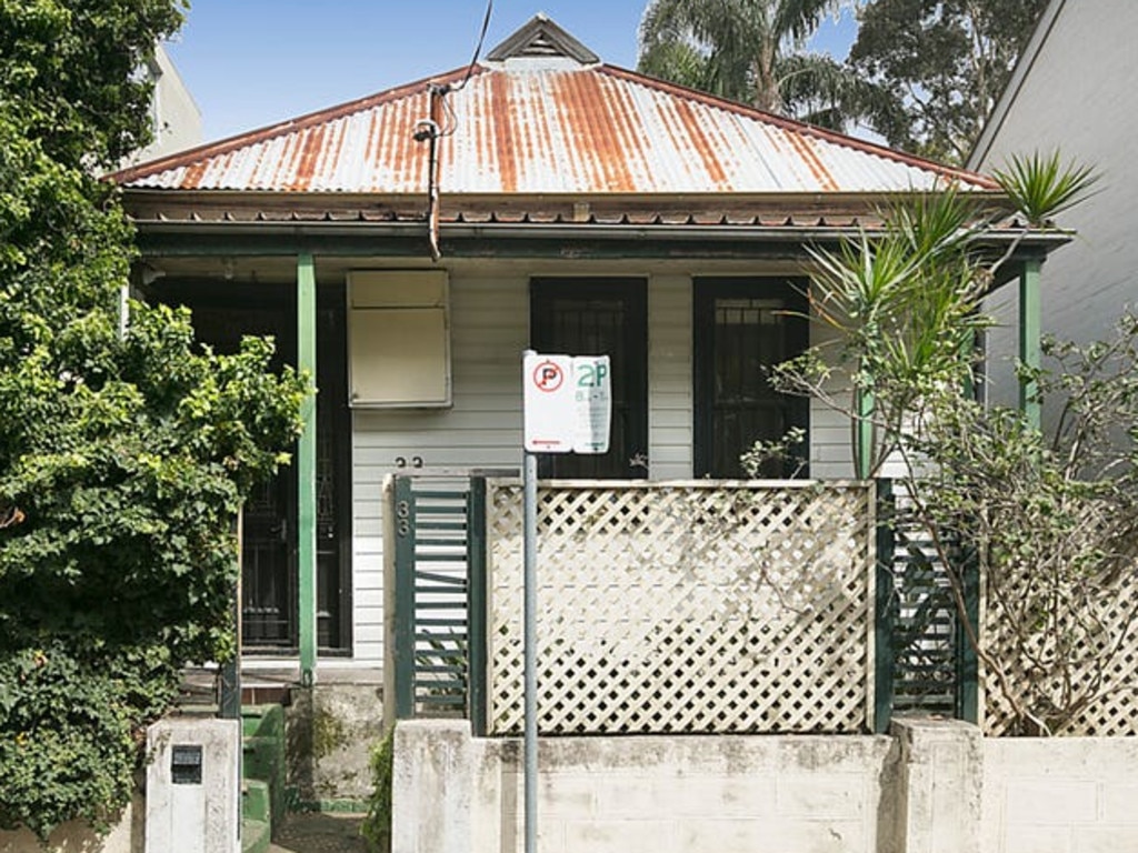 From the rusting roof, to the encroaching shrubbery, the cottage in its before state looked old and “sad,” says Mr Davidson. Picture: Supplied.