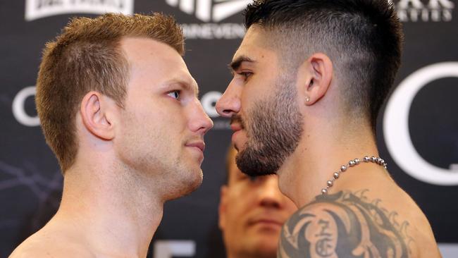 Jeff Horn and Michael Zerafa weigh in at Novotel Brisbane Southbank.17th December 2019 Brisbane AAP Image/Richard Gosling