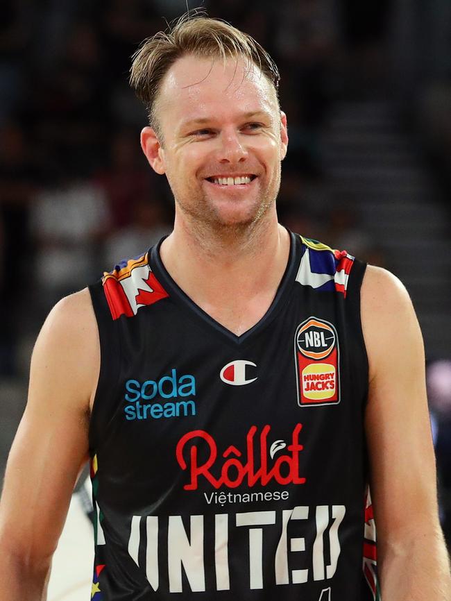 Still smiling: Newley after United’s win over Adelaide 36ers. Picture: Getty Images