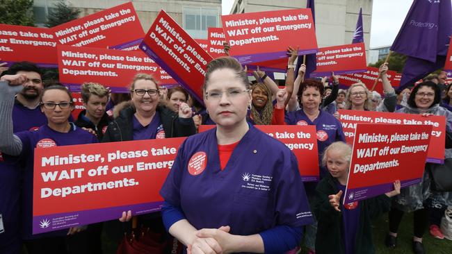 ANMF (SA Branch) CEO/Secretary Elizabeth Dabars leads the members of the Australian Nursing and Midwifery Federation (SA Branch) in a stop work meeting outside the Flinders Medical Centre on Tuesday. Picture: AAP / Kelly Barnes