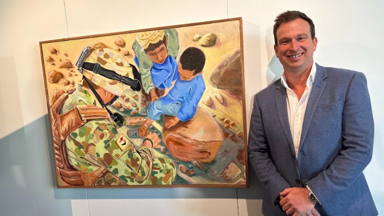 Sean Halfpenny with his painting Gentle Soldier which was highly commended at the Napier Waller Art Prize. Picture: Supplied