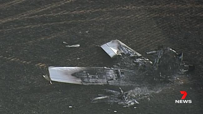 A light plane with two men on-board has crashed and caught fire at Merriton near Crystal Brook. Picture: 7News