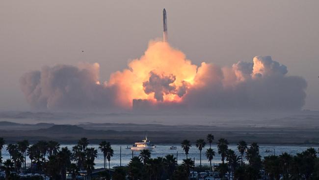 A SpaceX Starship rocket launches from Starbase during a test flight in Boca Chica, Texas, in November. A first attempt to fly the spaceship in its fully-stacked configuration in April ended in a spectacular explosion over the Gulf of Mexico. Picture: Timothy A. Clary/AFP