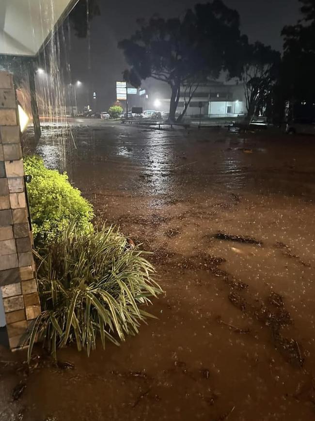 Residents upload a photo showing a minor flooding on Ishmael road behind Stockland and Redlynch. Picture: Supplied.