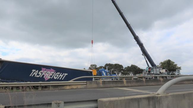 A truck driver has died after veering off a highway in northwest Victoria and crashing onto a nearby railway line overnight.