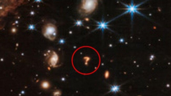 This question mark-shaped object hanging in space caught scientists by surprise. Picture: ESA.