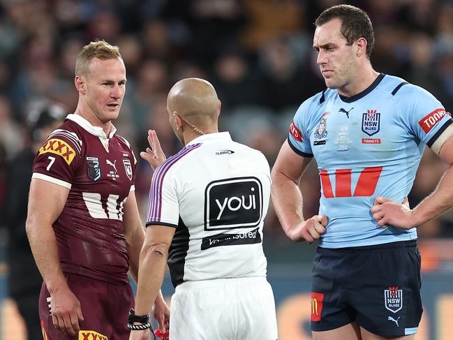 MELBOURNE, AUSTRALIA - JUNE 26:  Referee Ashley Klein talks to Daly Cherry-Evans of the Maroons and Isaah Yeo of the Blues during game two of the men's State of Origin series between New South Wales Blues and Queensland Maroons at the Melbourne Cricket Ground on June 26, 2024 in Melbourne, Australia. (Photo by Cameron Spencer/Getty Images)