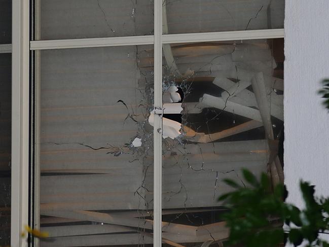 The window of a house shot up in the Hills District. Picture: Bill Hearne