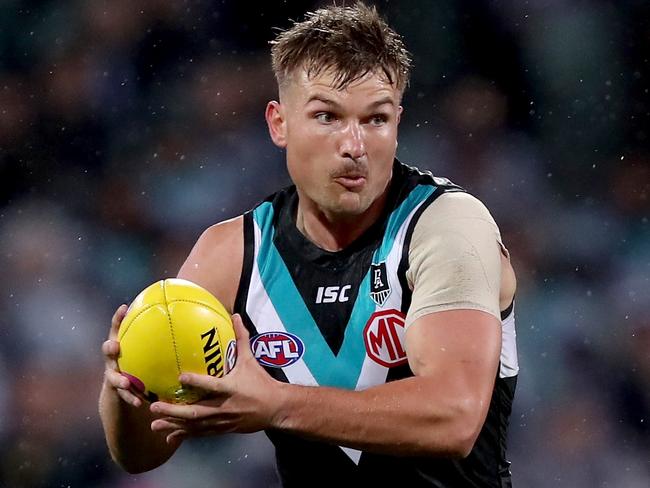 ADELAIDE, AUSTRALIA - OCTOBER 16: Ollie Wines of the Power in action during the 2020 AFL First Preliminary Final match between the Port Adelaide Power and the Richmond Tigers at Adelaide Oval on October 16, 2020 in Adelaide, Australia. (Photo by James Elsby/AFL Photos via Getty Images)