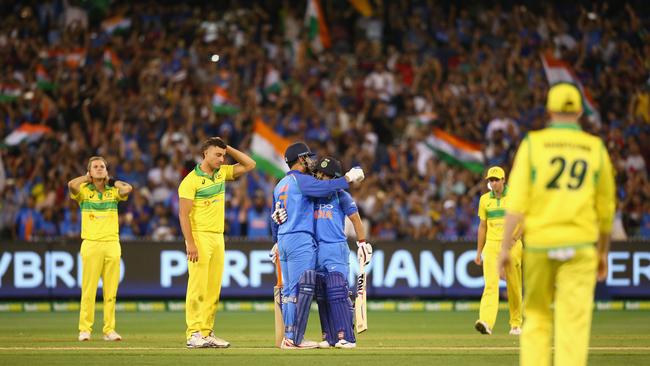 MS Dhoni and Kedar Jadhav celebrate India’s victory in the third ODI. Picture: Getty Images