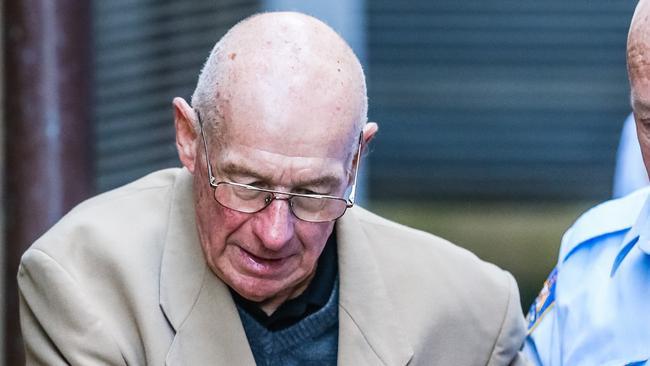 Roger Rogerson is taken away by Corrective Services after being found guilty for Murder of Jamie Goa . Picture Craig Greenhill