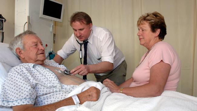 Cardiologist Dr Philip Tideman with heart patient Brian Exton of Bordertown with his wife Lyn. Picture: File