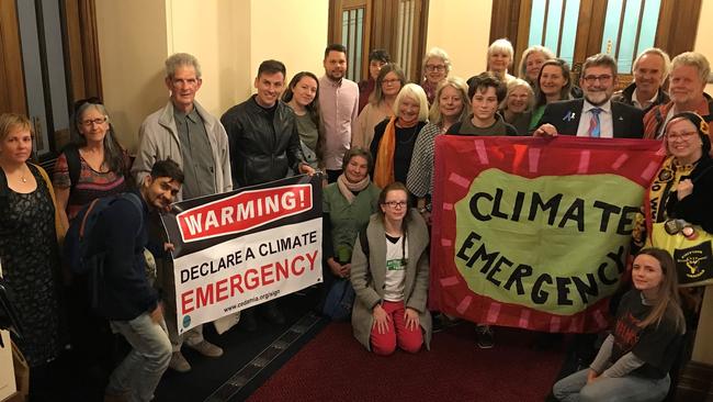 Supporters of the climate change emergency motion in Parliament after the motion was passed. Picture: Mark Parnell