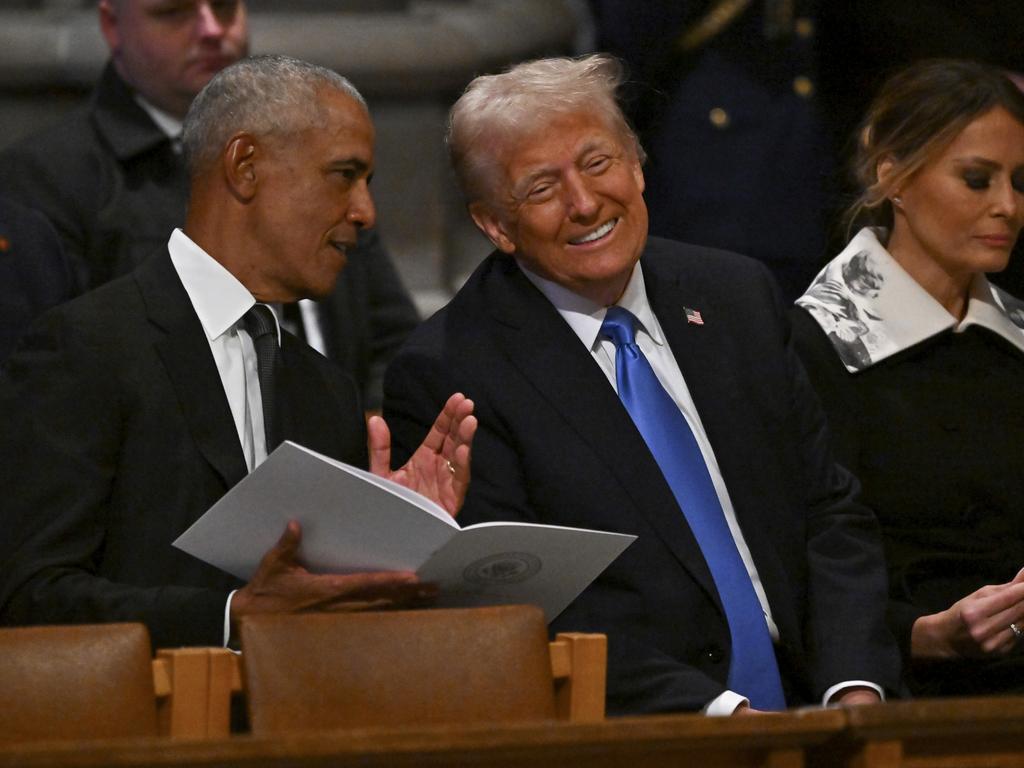 Barack Obama and Mr Trump looked friendly at President Jimmy Carter’s funeral. (Ricky Carioti/The Washington Post via AP, Pool)