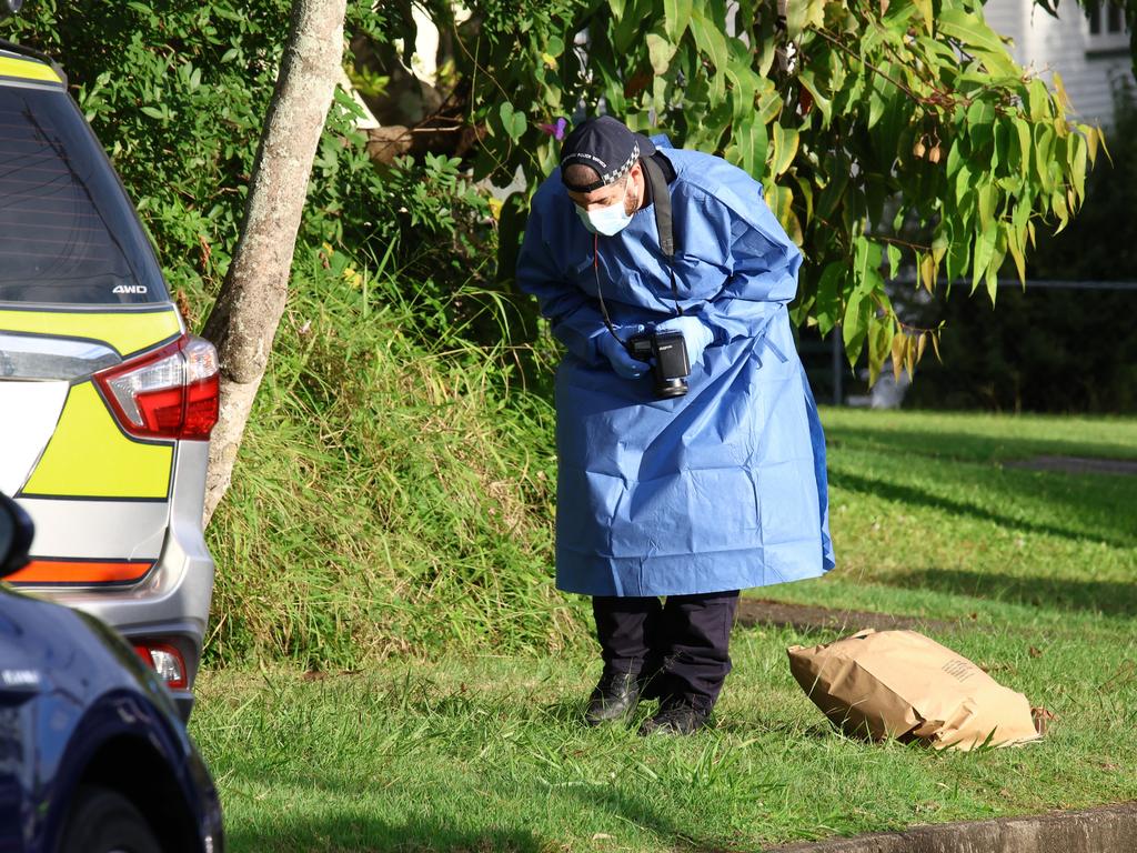 Scenes of crime photographers at an Acacia Ridge stabbing. Picture: David Clark