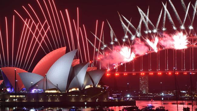 New Year's Eve fireworks erupt over the Sydney Harbour Bridge and Opera House during the fireworks show on January 1, 2019. Picture: Peter Parks/AFP