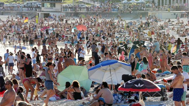 Beachgoers ignored advice on social distancing on Friday as temperatures soared. Picture: AAP