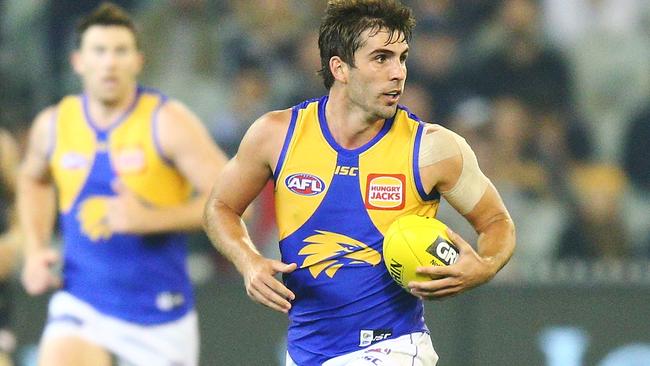 Andrew Gaff of the Eagles runs with the ball.