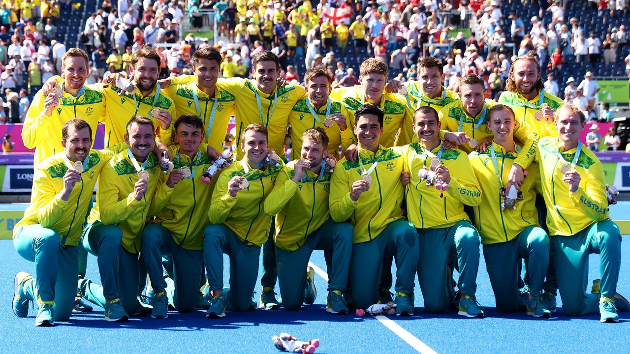 BIRMINGHAM, ENGLAND - AUGUST 08: Gold medalists Team Australia celebrate during the Men's Hockey - Medal ceremony on day eleven of the Birmingham 2022 Commonwealth Games at University of Birmingham Hockey &amp; Squash Centre on August 08, 2022 on the Birmingham, England. (Photo by Elsa/Getty Images)