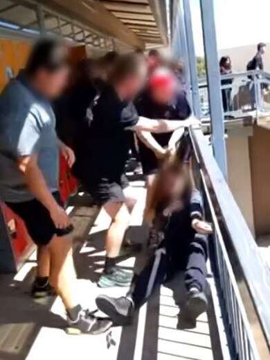 A girl is dragged during the fight at The Heights School at Modbury Heights. Picture: Supplied