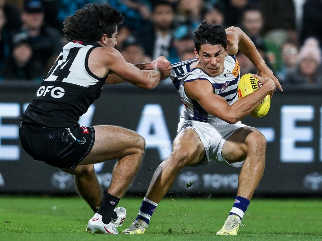 Lachie Jones tackles Bailey Banfield. Picture: Mark Brake/Getty Images)