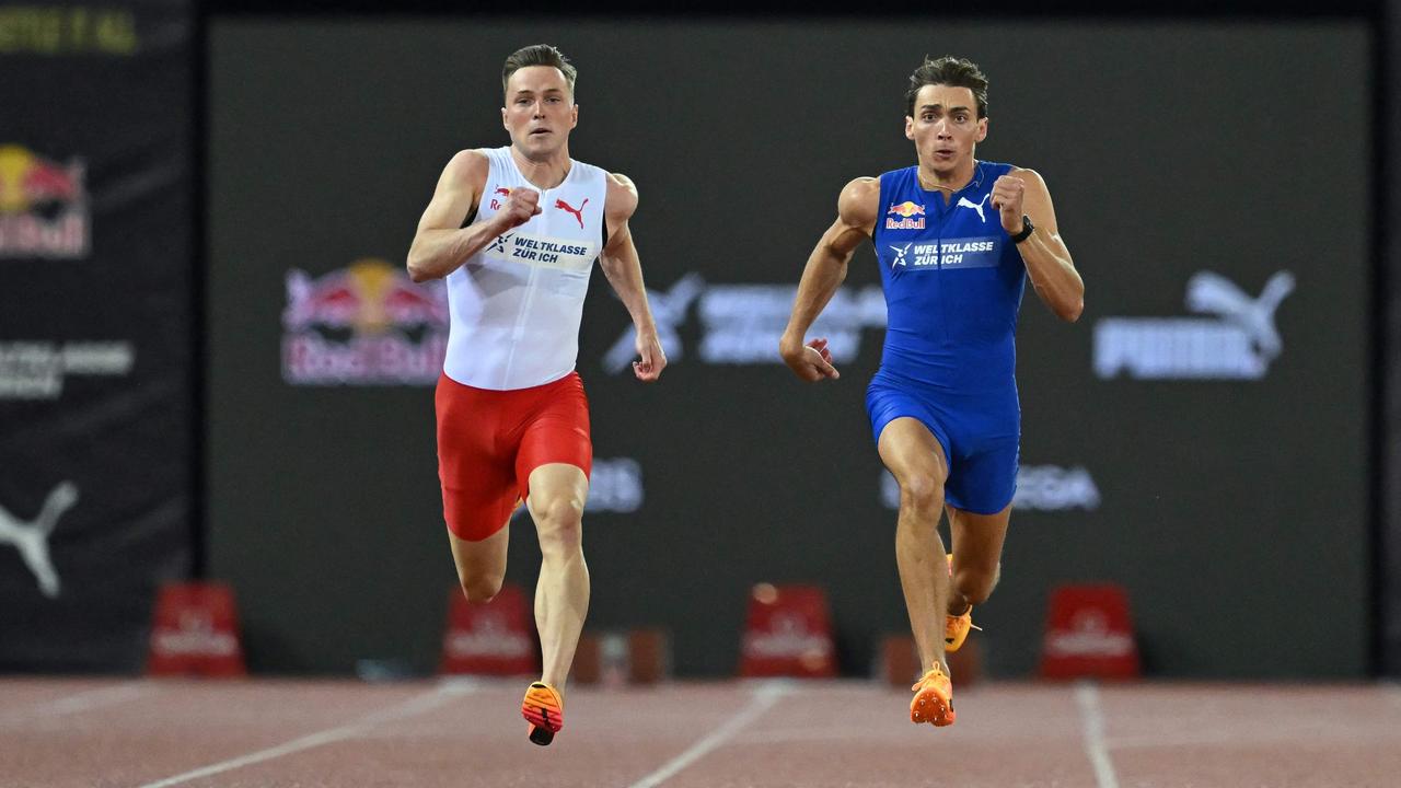 Norwegian hurdler and sprinter Karsten Warholm and Swedish pole vaulter Armand Duplantis. Photo by Fabrice COFFRINI / AFP