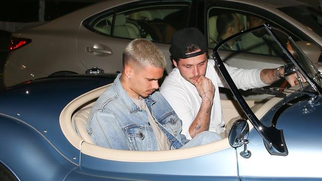 ONE TIME WEB USE FOR NEWS.COM.AU ONLY - FEES APPLY -  AU_2940675 - Los Angeles, CA  -  *EXCLUSIVE*  - Brooklyn and Romeo Beckham were seen leaving dinner at Il Pastaio in Beverly Hills, with Brooklyn driving his custom retro blue 1956 Jaguar XK140, valued at $500k.    Pictured: Brooklyn Beckham, Romeo Beckham    BACKGRID Australia 4 JUNE 2024     BYLINE MUST READ: The Hollywood JR / BACKGRID    Phone: + 61 419 847 429  Email:  sarah@backgrid.com.au