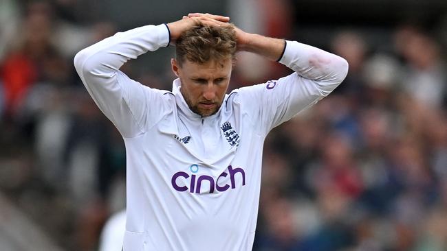 England's Joe Root reacts while bowling on day four of the fourth Ashes cricket Test match between England and Australia at Old Trafford cricket ground in Manchester, north-west England on July 22, 2023. (Photo by Oli SCARFF / AFP) / RESTRICTED TO EDITORIAL USE. NO ASSOCIATION WITH DIRECT COMPETITOR OF SPONSOR, PARTNER, OR SUPPLIER OF THE ECB